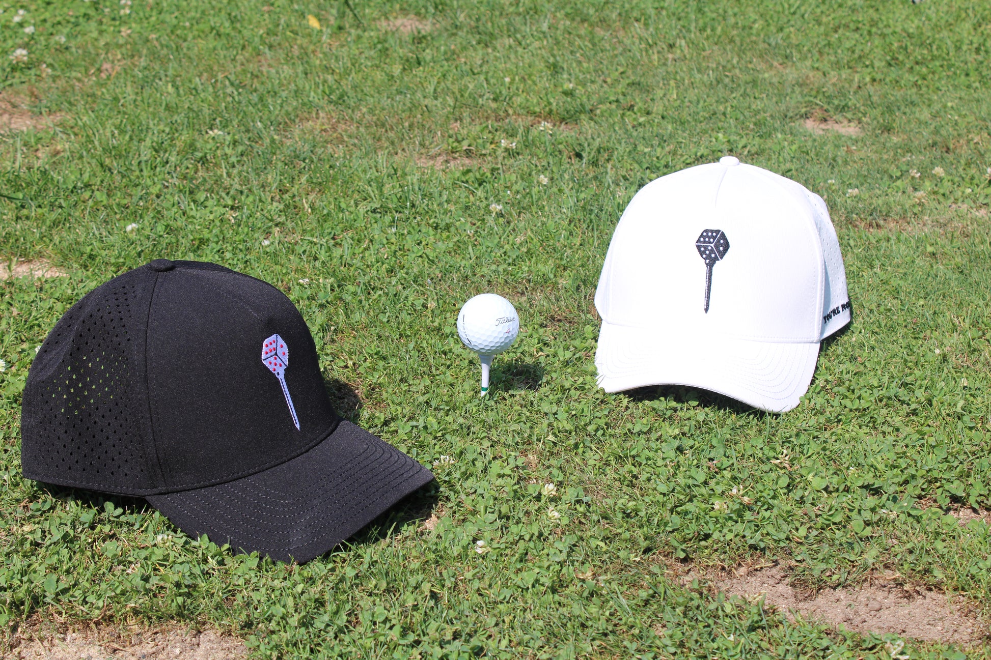 You're Rolled Classic Black hat flat lay on green turf